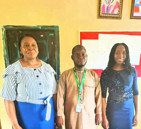 Dr. Diso alongside the two NOUN nursing students